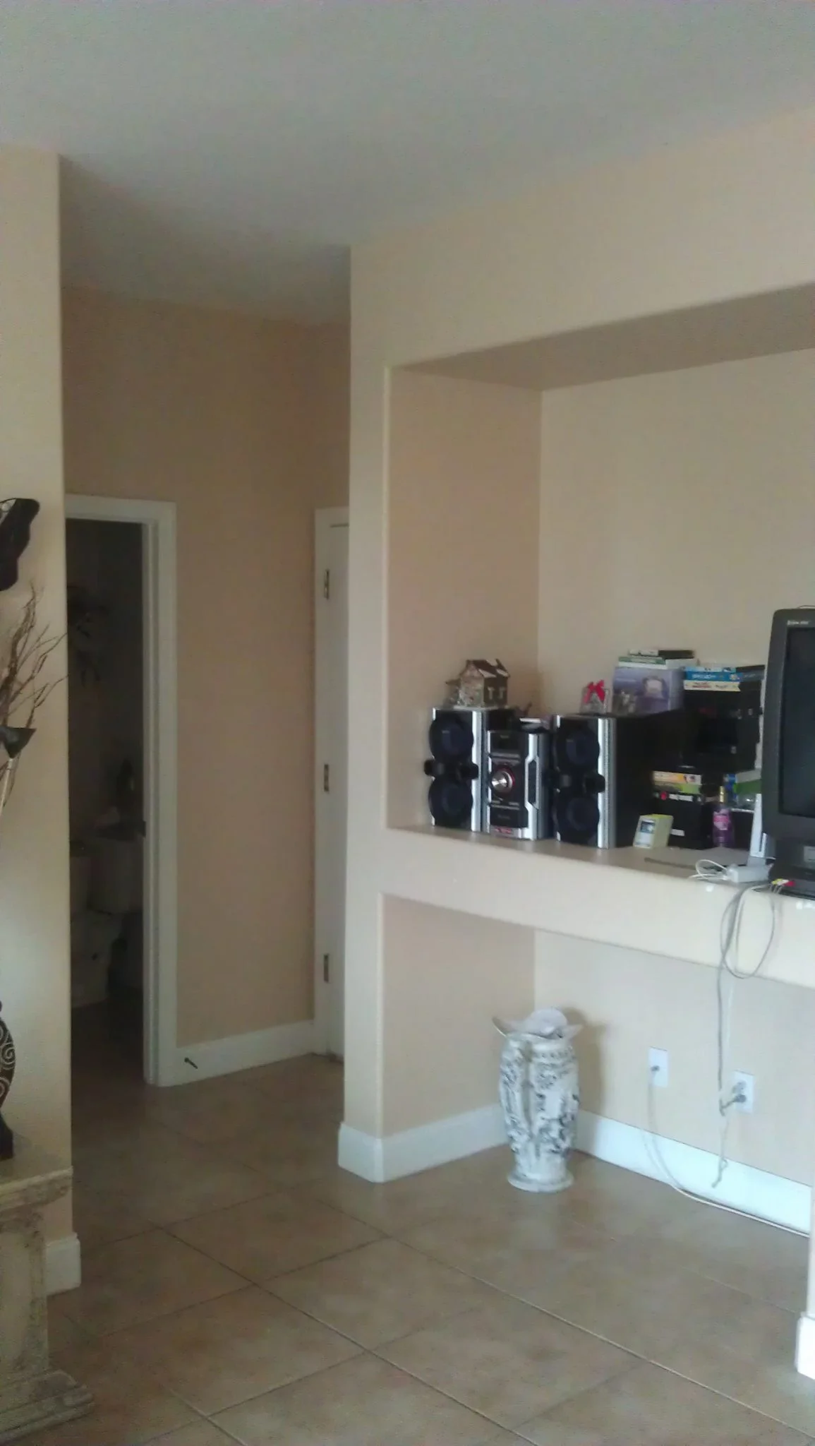 This is what the TV shelf look like before I moved in.